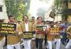 Video: Khaki clad KTR drives auto to Telangana Assembly in protest