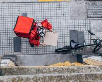 Ex-Afghan minister delivers food on bicycle in Germany