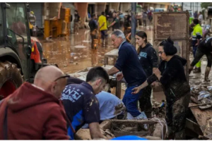 Spain searches for bodies after flood of the century claims at least 95 lives