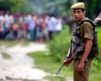 Indian photographer in video stomps on man shot by Assam police